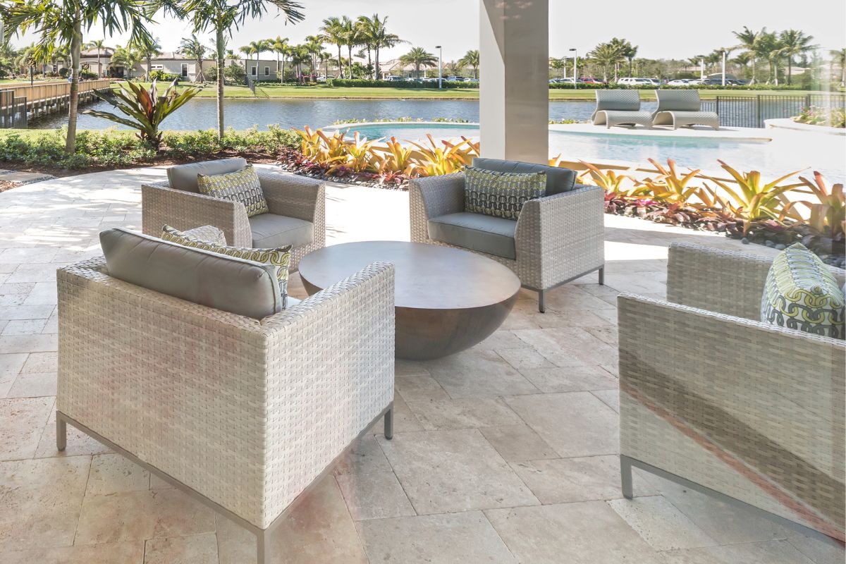 Luxuries patio gray furniture with a round wooden table
