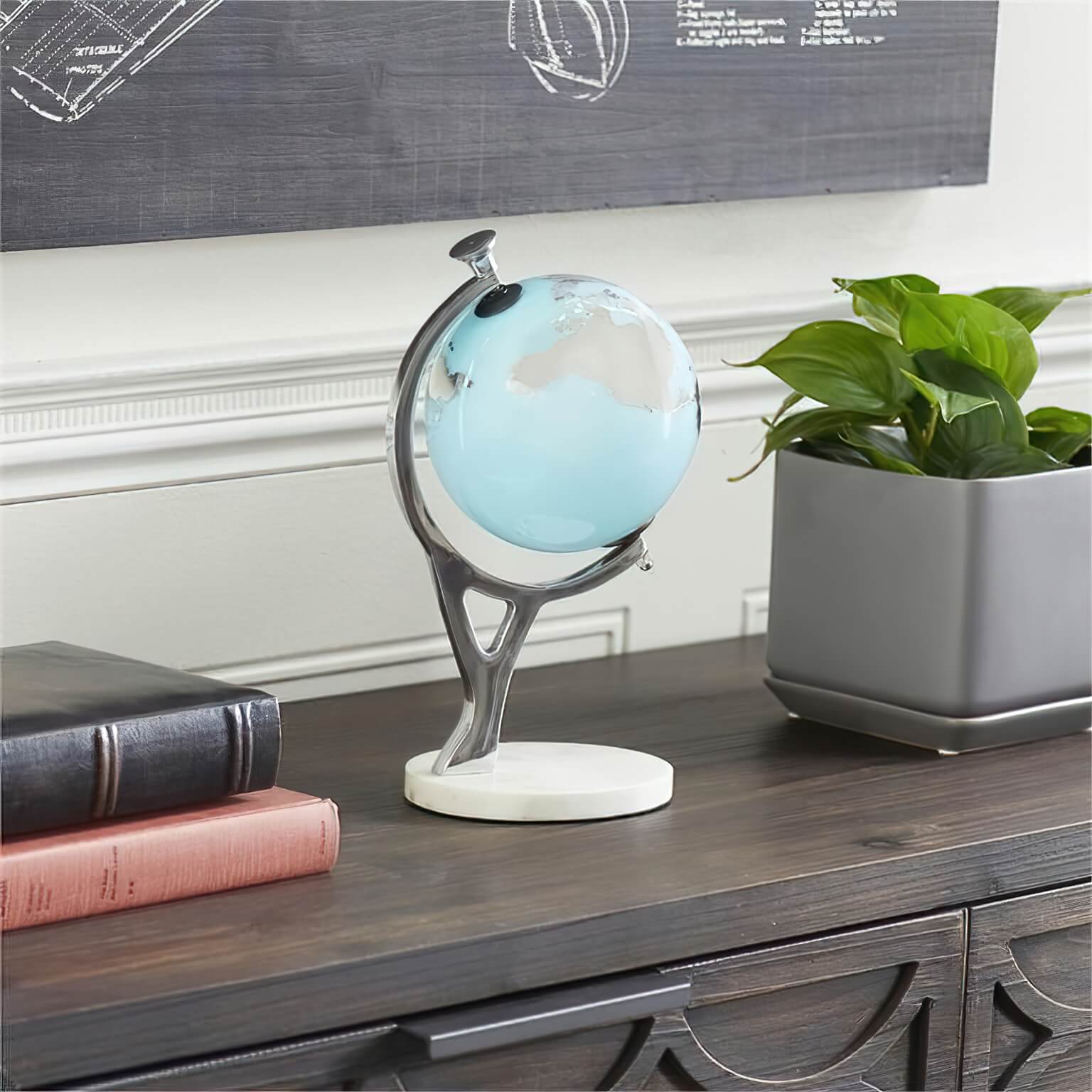 Arctic Blue Glass Globe on a White Marble Stand Elevate Home Decor - Sculptures & Statues