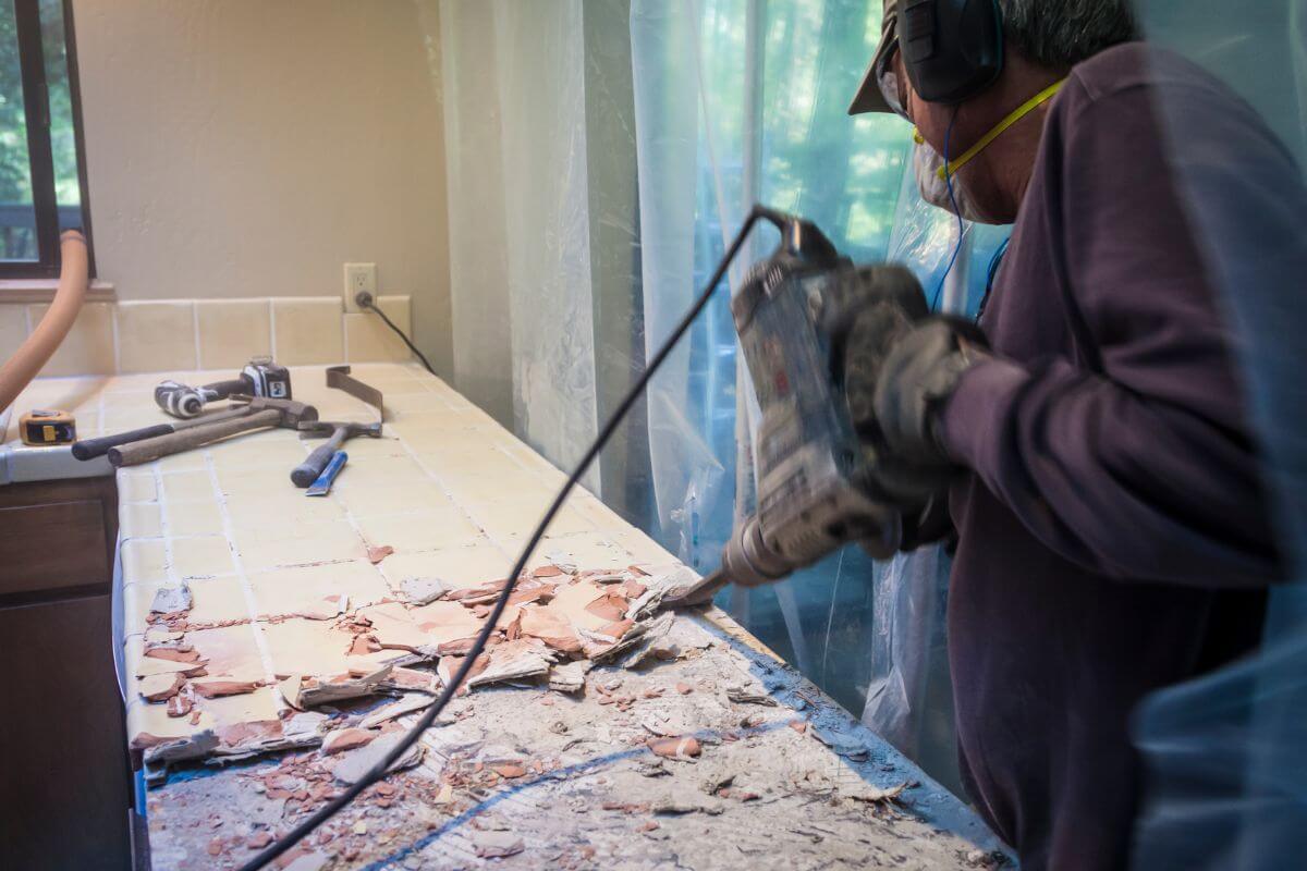 Breaking the kitchen tiles while remodeling the kitchen