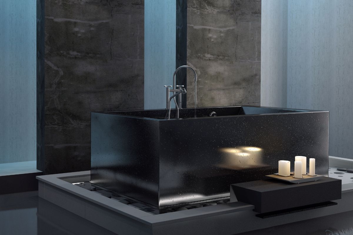 Elegant and luxuries bathroom in black color. Bathtub is also black and elevated 
