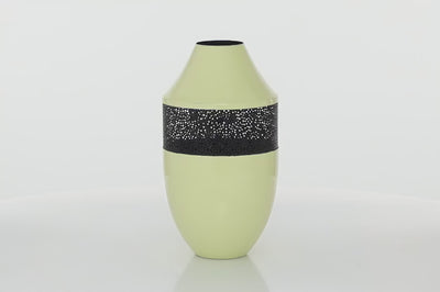 Beige metal oval vase with narrow opening. In the middle of the vase is flower inspired mashed part in black color. The vase is spinning in 360 degrees. Background is all white