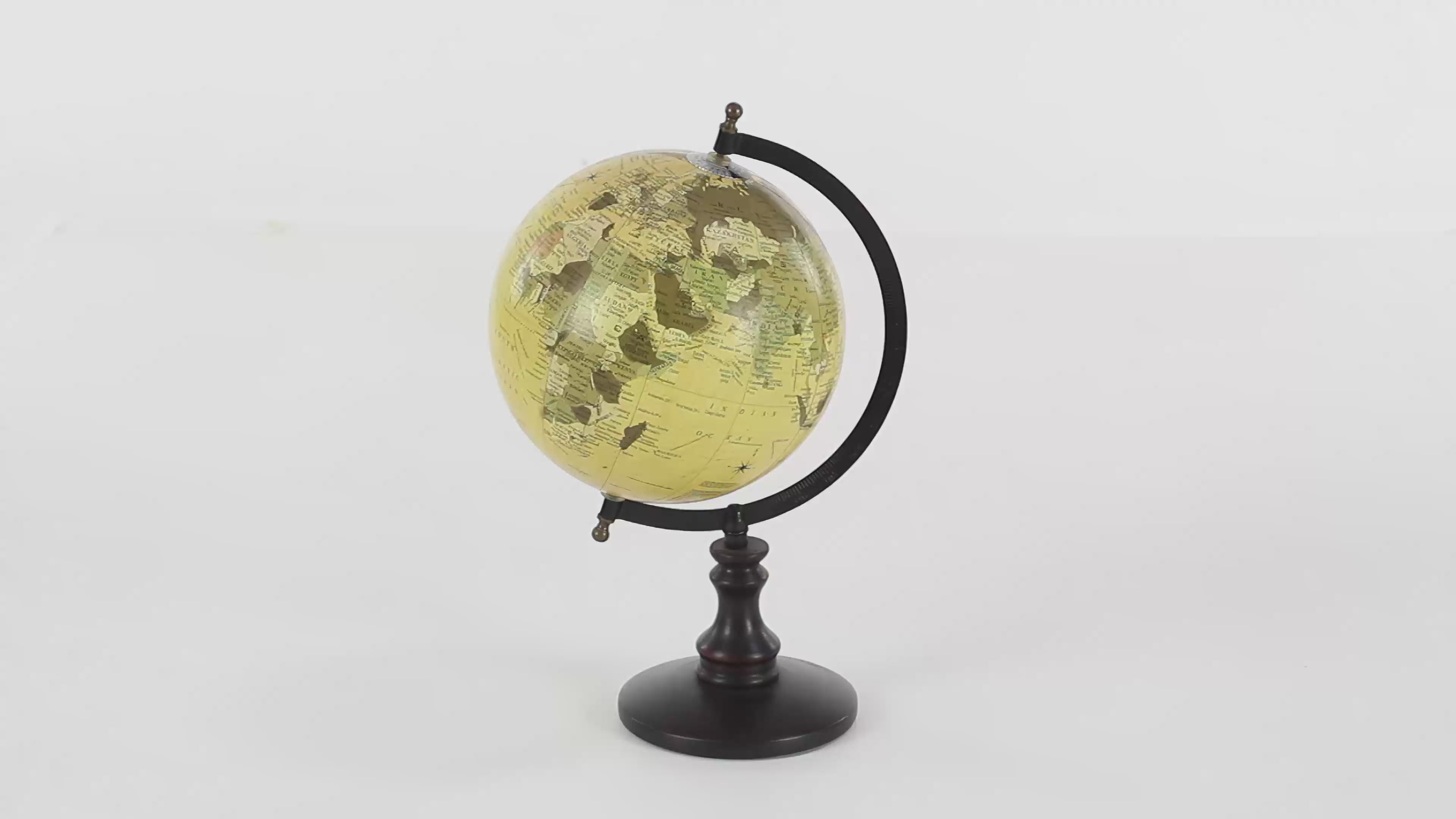 Made in a traditional design with a round dark brown stand, black metal mount and yellow sand globe. Globe is spinning in 360 degrees and all background is white