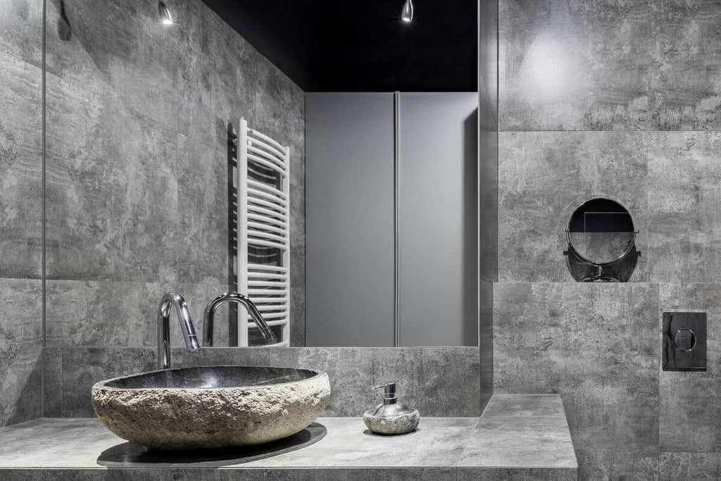 Gray bathroom with stone vessel sink