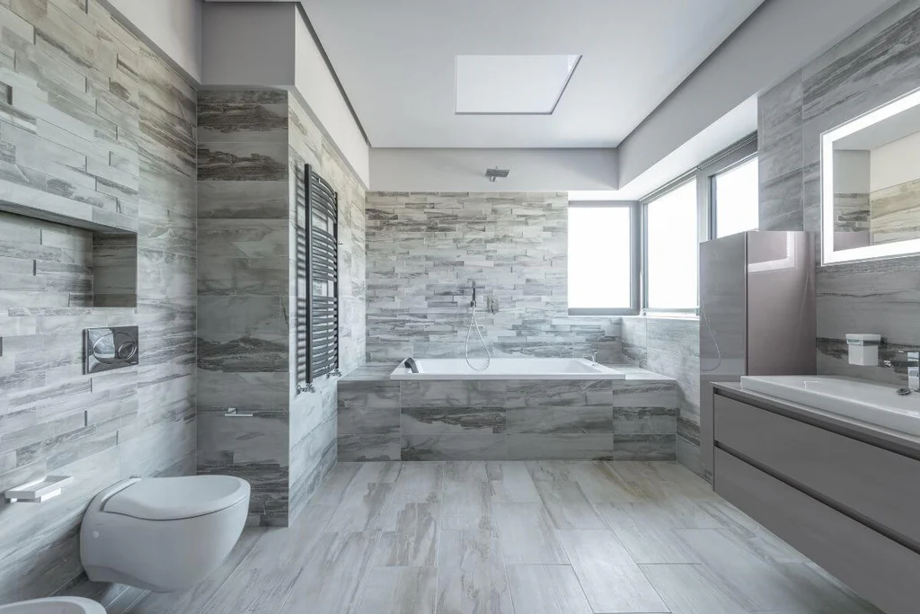 Bathroom with different shades of gray tiles