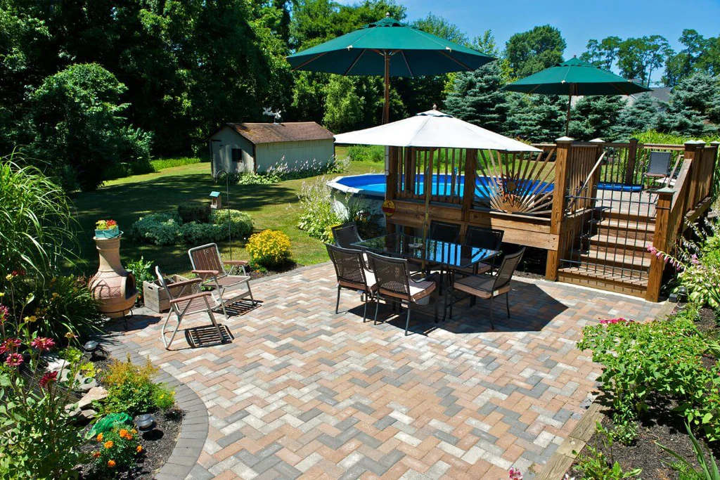 Concrete patio covered with pavers