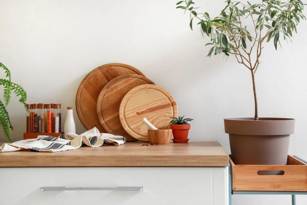 Round wooden cutting boards displayed on the kitchen counter