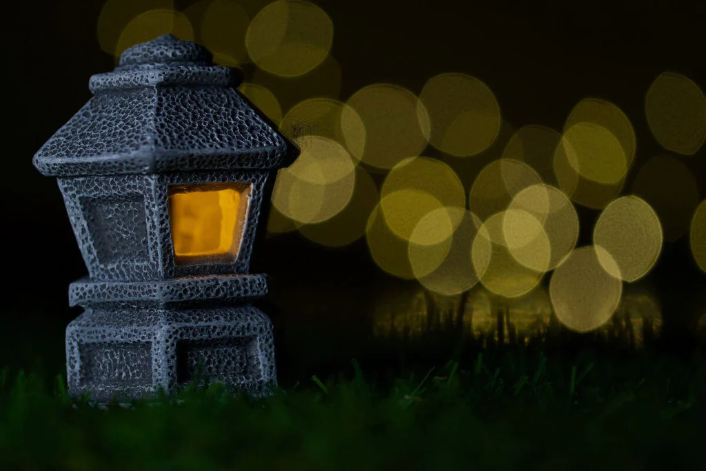 Stone lanterns for nighttime garden ambiance
