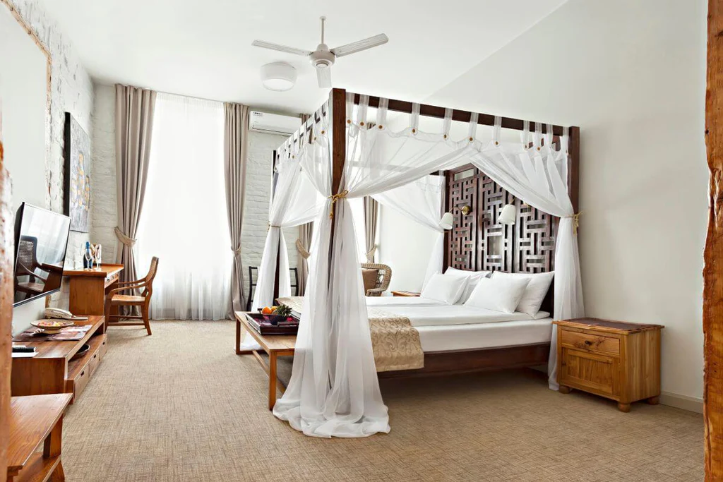 bedroom with bed canopy