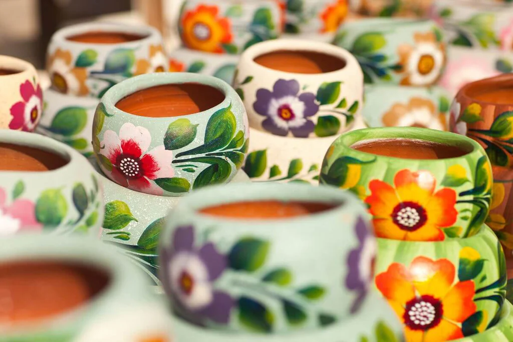Colorful terracotta pots with flower design
