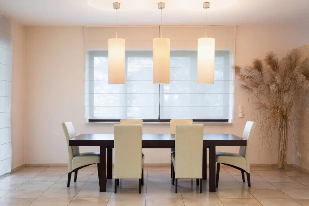 Statement lighting above the dining table