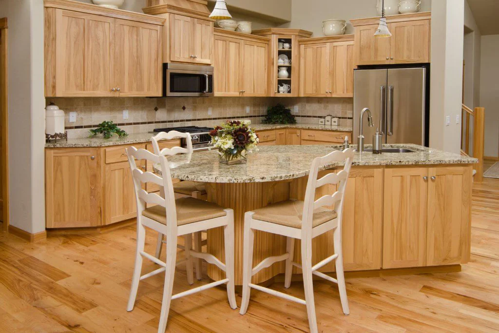 kitchen island that is also a dining table 26a13597 f1ce 4358 a86b