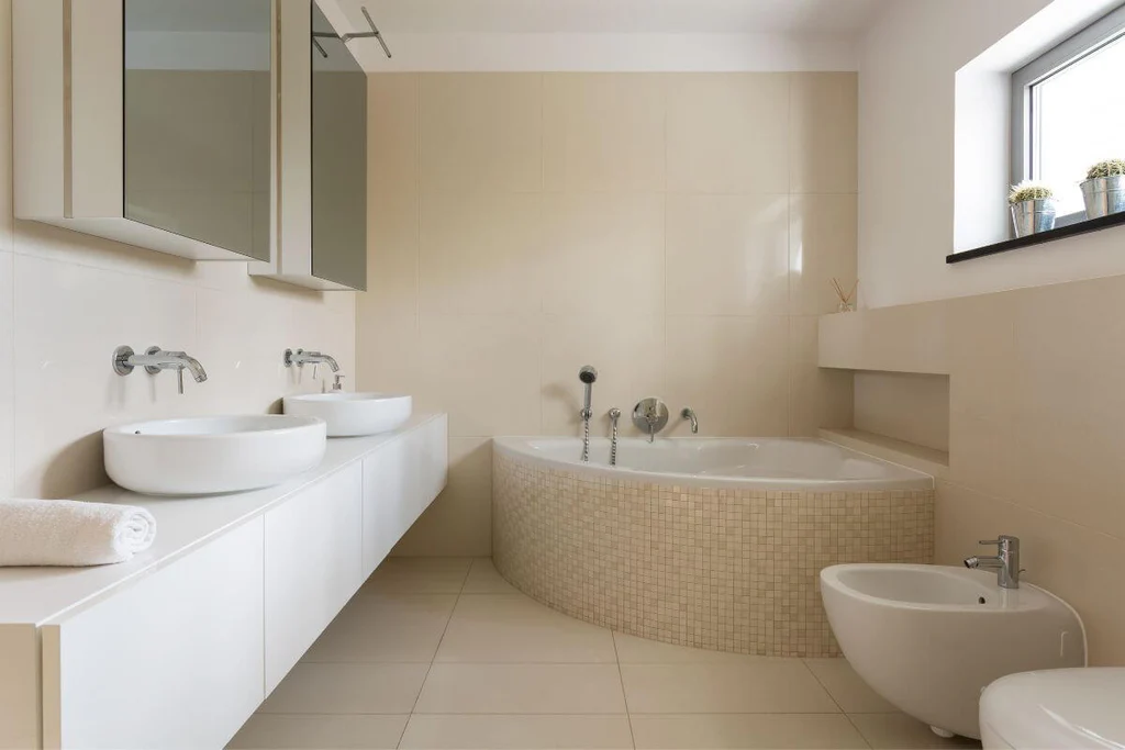 Floating vanity in a minimal neutral bathroom