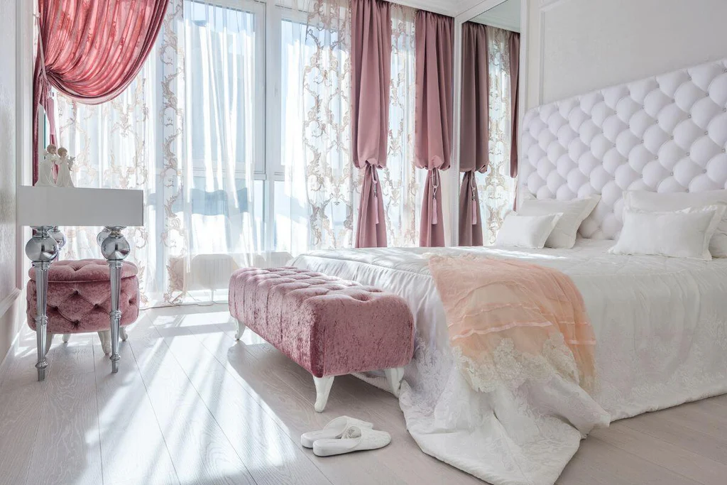 Pastel bedroom in white color with pink decor
