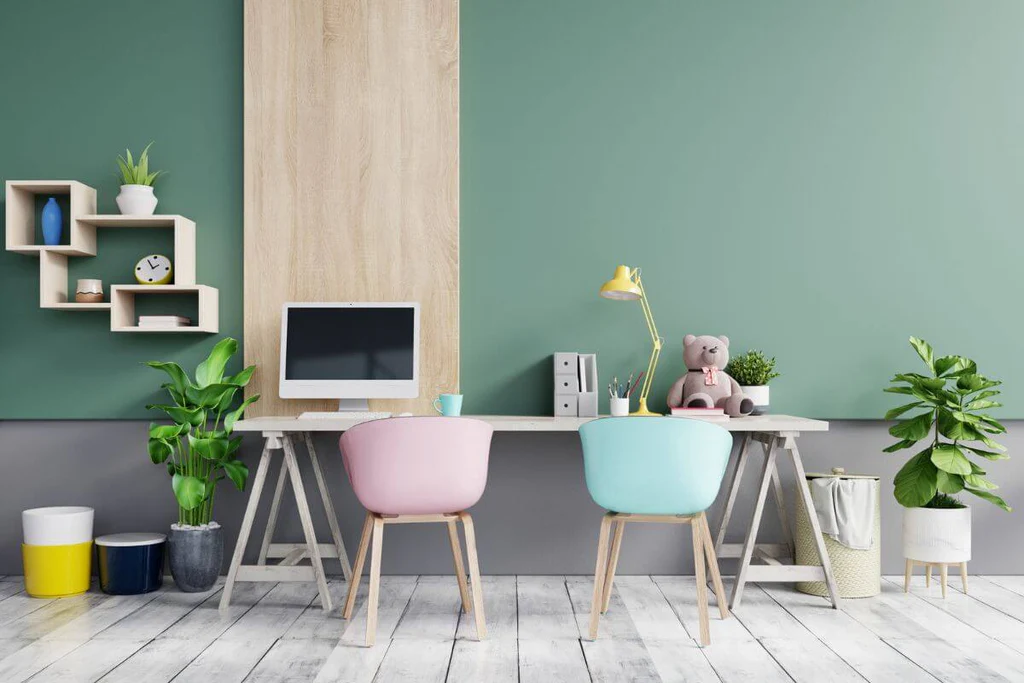 Pastel office in mint green color with blue and pink pastel chairs