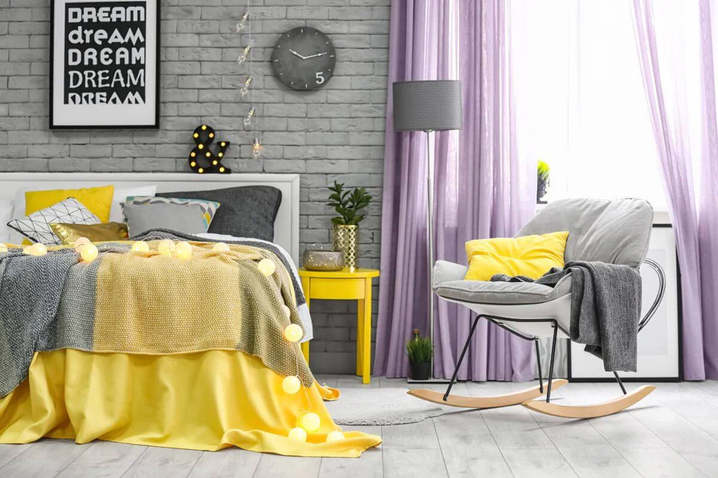 Pop of yellow color in a bedroom