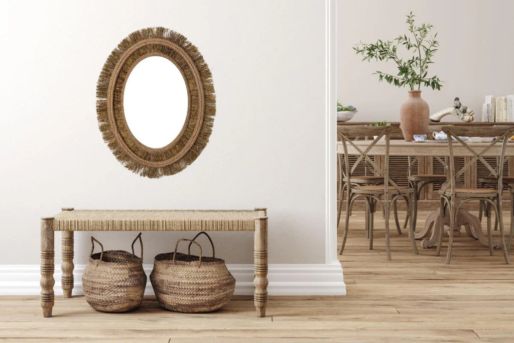 Rattan wooden mirror above the side table