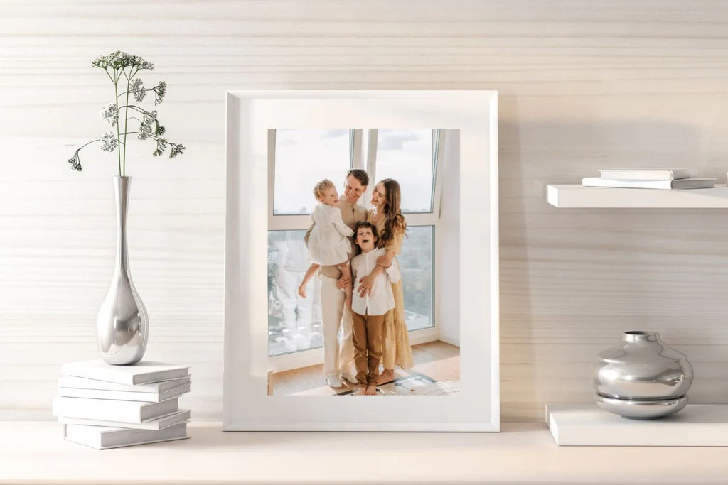 Wooden side table with a framed family photo 