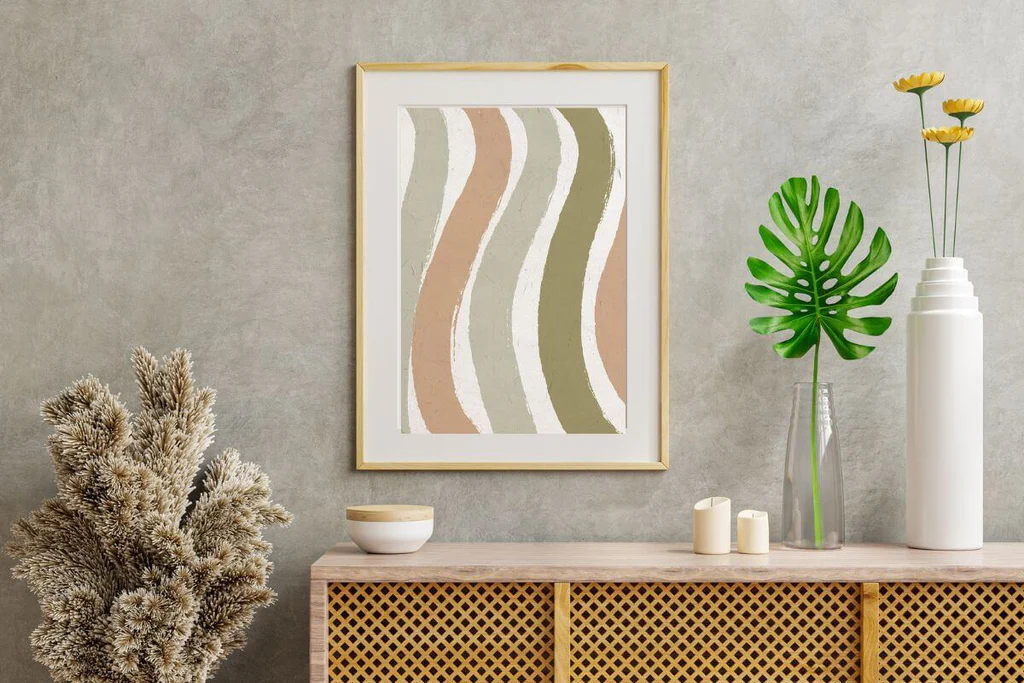 The colorful striped canvas above the dresser 