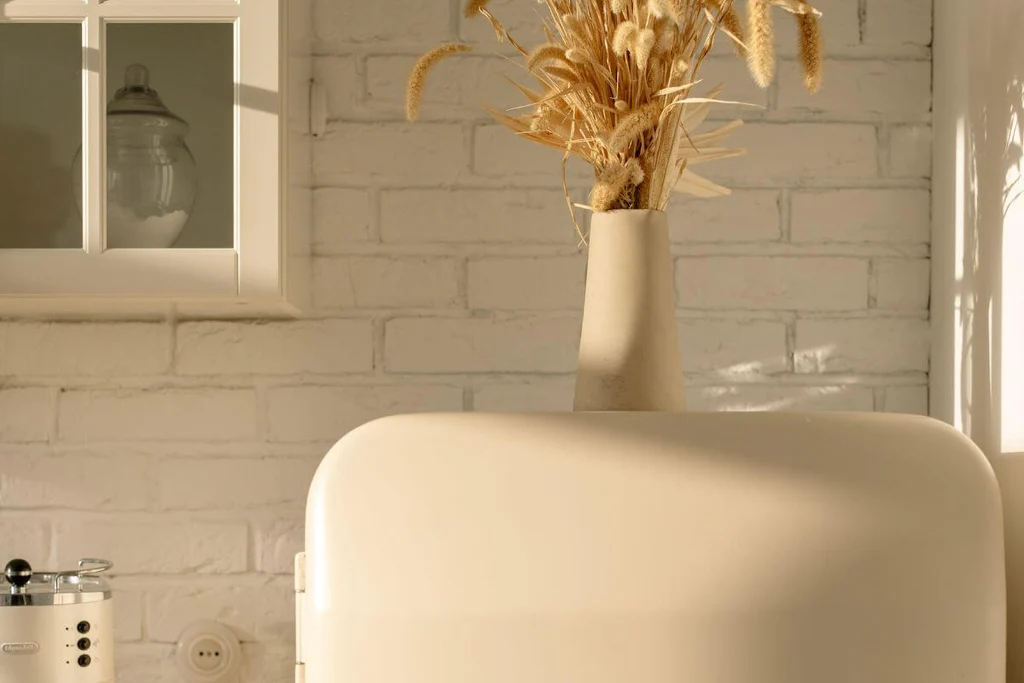 White vase as above fridge top decor ideas