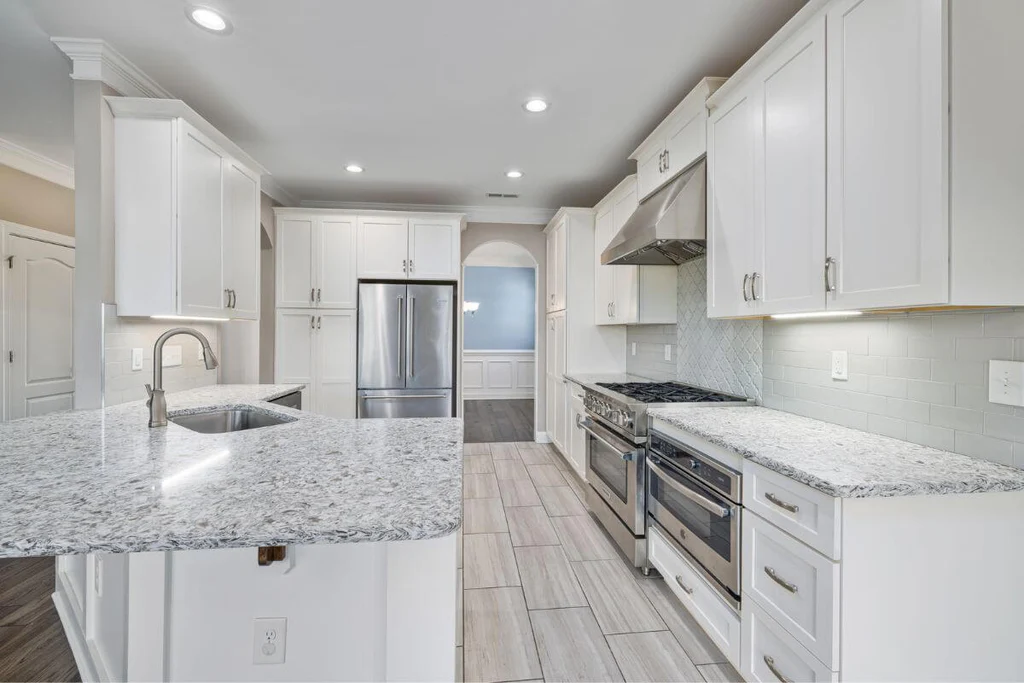 White cabinets in gray kitchen